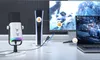 A gaming setup with a microphone, PlayStation 5 console, monitor, and laptop. Náhled obrázku produktu