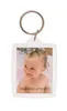 A keychain with a photo frame holding a picture of a baby. Produktbild-Vorschau