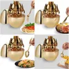Collage of four images showing a golden cutlery set in a spherical holder, with hands using the cutlery to eat different dishes. Produktbild-Vorschau