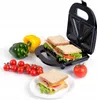 A sandwich maker with sandwiches and ingredients. Náhľad obrázku produktu