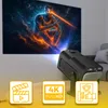A black projector is projecting an image of a cosmic being onto a wall. Three icons are displayed at the bottom of the image. Voir les images du produit