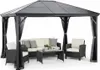 A gazebo with outdoor furniture set up inside. Produktbild-Vorschau