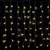 A curtain of warm white LED lights against a black background. Produktbild-Vorschau