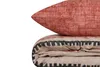 A folded duvet and pillow with a patterned design. Náhľad obrázku produktu