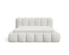 A beige upholstered bed frame with a mattress on a white background. Voir les images du produit