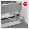 Close-up view of a kitchen waste bin system installed in a cabinet. Produktbild-Vorschau