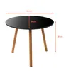 A black round side table with three wooden legs, shown with dimensions indicated by red lines and text. Produktbild-Vorschau