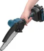 A hand holding a cordless chainsaw. Produktbild-Vorschau