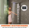 A woman is using a modern shower panel system in a bathroom. Náhľad obrázku produktu