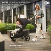 A woman pushing a stroller with a child in it, outdoors on a wooden deck. Voir les images du produit