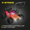 A remote-controlled car and its controller are shown against a dark background. Anteprima dell’immagine prodotto