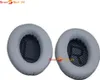 Two grey ear pads for headphones are shown against a white background. Produktbild-Vorschau