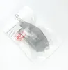 A gray ear cushion for Microsoft Surface headphones is shown in a clear plastic bag. Voir les images du produit