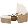 A modular outdoor seating set with a canopy and a lift-top table. Voir les images du produit
