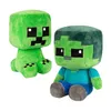 Two plush toys, a Creeper and a Zombie, from the video game Minecraft, are sitting side-by-side against a white background. Produktbild-Vorschau