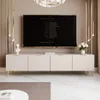 A modern living room setup featuring a TV stand with a television. Voir les images du produit