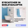 A modern bathroom with a wall-mounted toilet and towels on a rack, showcasing a product in a minimalist design. Náhled obrázku produktu