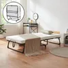 A folding bed is set up in a room with a wooden floor and a window. Produktbild-Vorschau