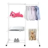 A white rolling laundry rack with clothes, a pillow, a stuffed toy, and shoes. Produktbild-Vorschau