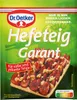 A package of Dr. Oetker Hefeteig Garant, showing a prepared dish. Produktbild-Vorschau
