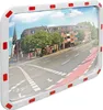 A convex mirror reflecting a street scene with buildings, trees, and road markings. Podgląd zdjęcia produktu