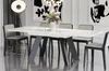 A modern dining room with a white high-gloss dining table and chairs. Anteprima dell’immagine prodotto