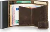A brown leather wallet with euro banknotes and cards inside, next to a gray metal card holder. Produktbild-Vorschau