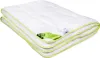 A folded white duvet with a green trim and a green label attached. Náhľad obrázku produktu