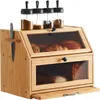 A wooden bread box with glass windows, containing bread and pastries, and topped with spice jars. Produktbild-Vorschau