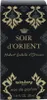The image shows the packaging of a perfume bottle. Voir les images du produit