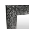 A close-up view of the corner of a black picture frame with an intricate embossed pattern. Náhľad obrázku produktu