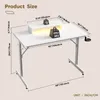 A diagram showing the dimensions of a white desk with a monitor stand, weights, and a cup holder. Anteprima dell’immagine prodotto