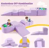 A collage of images showing a purple foam play set for children, including slides, ramps, steps, and a ball pit. Some images show children interacting with the play set. Produktbild-Vorschau