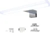 A bathroom light fixture and its mounting hardware are displayed against a white background. Voir les images du produit