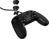A black gaming controller with several interchangeable directional pads and joysticks shown above it. Náhled obrázku produktu