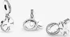 Three views of a silver charm with a horseshoe and a four-leaf clover design, set against a white background. Produktbild-Vorschau