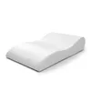 A white orthopedic pillow for leg elevation, shown on a white background. Produktbild-Vorschau