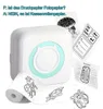 Weißer Mini-Thermodrucker mit hellblauem Akzent, der eine Papierrolle mit Cartoon-Tieren druckt, neben anderen bedruckten Blättern Náhled obrázku produktu