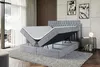 A bedroom scene with a bed that has its storage compartment open. Produktbild-Vorschau