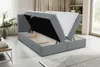 A bed with its storage compartment open, revealing the mattress and storage space. Produktbild-Vorschau