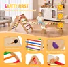 A child playing on a wooden climbing structure in a living room. Voir les images du produit