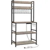 A freestanding kitchen baker's rack with shelves, hooks, and a power strip. Náhled obrázku produktu