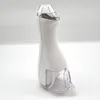 A white cordless water flosser with a clear reservoir sits on a white background. Produktbild-Vorschau