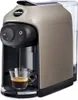 A Lavazza coffee machine is brewing an espresso into a glass cup. Produktbild-Vorschau