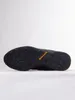 The sole of a black shoe is shown against a white background. Anteprima dell’immagine prodotto