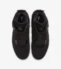A top-down view of a pair of black Nike Air Jordan 4 Retro "Black Cat" sneakers on a white background. Náhľad obrázku produktu