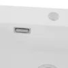 A close-up view of a white sink with a drain and a circular overflow drain. Náhled obrázku produktu