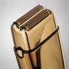 A close-up shot of the top of a golden electric shaver. Anteprima dell’immagine prodotto