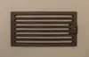 A cast iron grate on a plain background. Náhled obrázku produktu