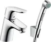 A chrome-finished faucet and a hand shower with its holder are displayed against a white background. Produktbild-Vorschau